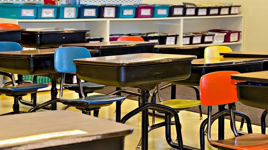 Suit accuses ex-principal of abuse, negligence, grooming